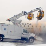 A plane being deiced at LaGuardia Airport